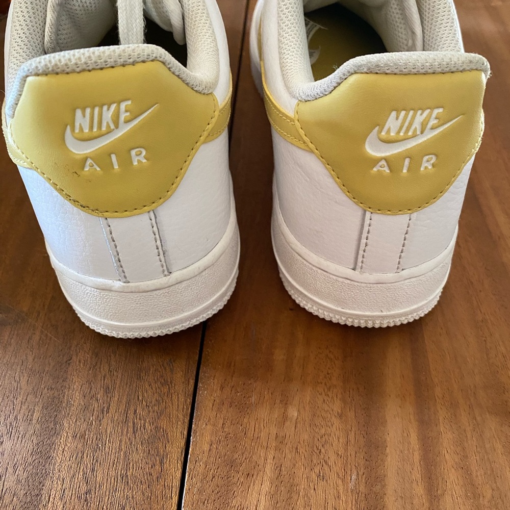 Nike Air Force ones white with yellow check. Women’s size 9.5 good condition